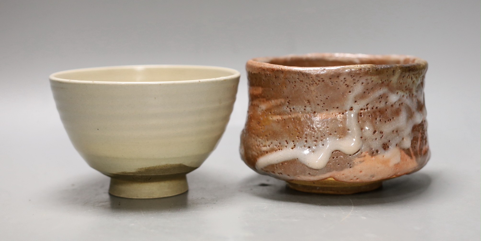 Two Japanese studio pottery chawan tea bowls, one with raku glaze, 12cm diameter